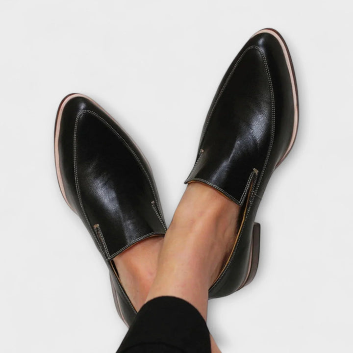 Women's black pointed-toe slip-on loafers, elegant & comfortable low heel for office or casual everyday wear.