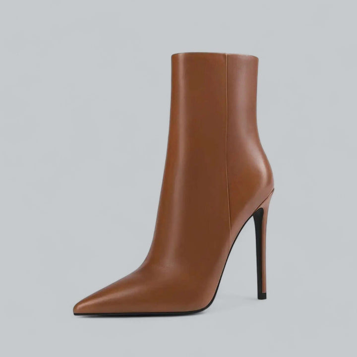 Stylish women's black pointed toe stiletto ankle boots, perfect fall & winter fashion footwear.