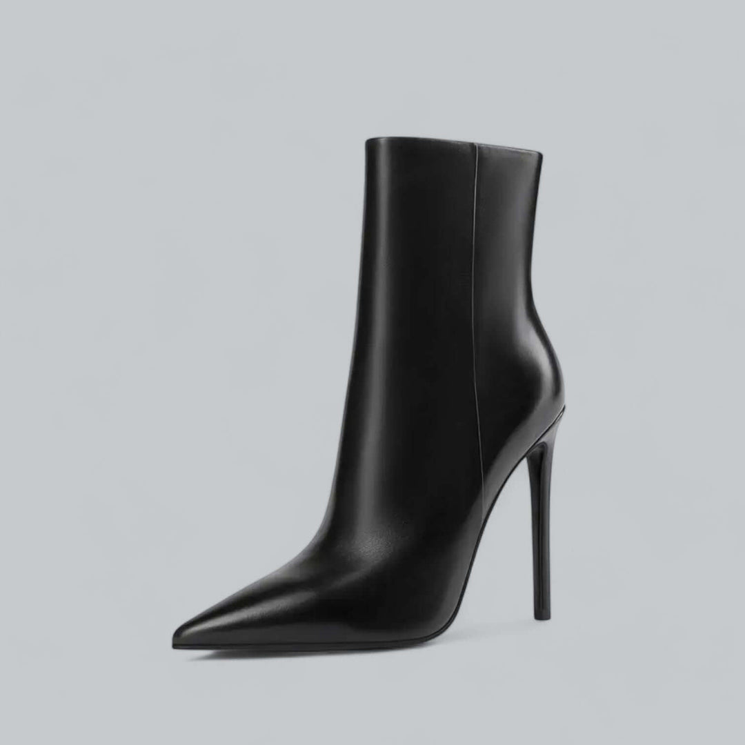Versatile women's pointed toe stiletto ankle boots, essential dress boots for fashion-forward women.