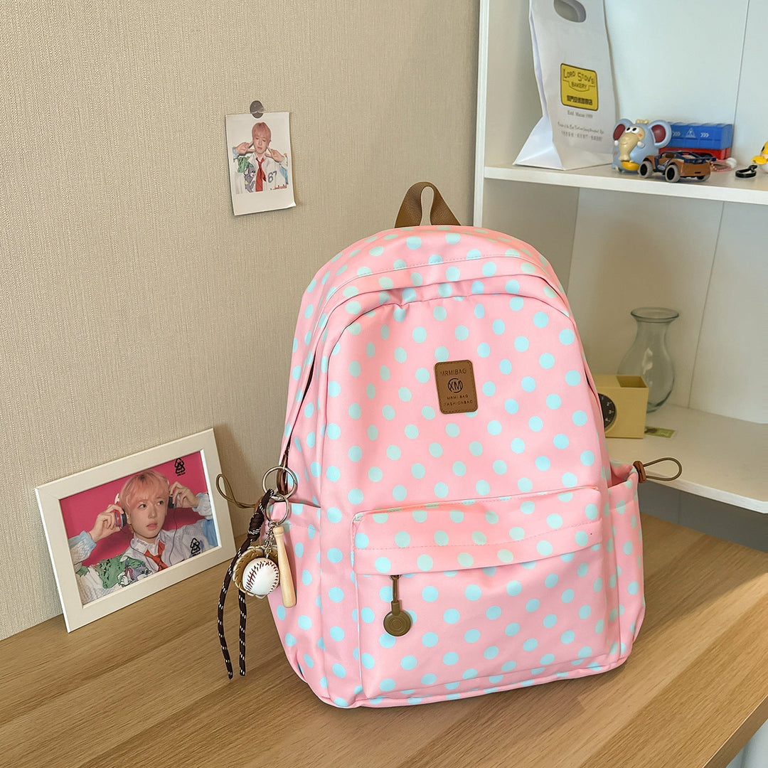 Stylish polka dot women's backpack with multiple compartments, a cute and practical school bag or daypack.