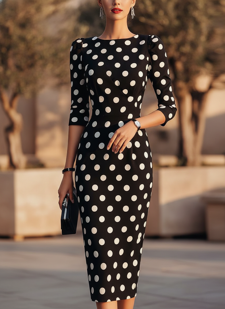 Women's black polka dot halter neck bodycon midi cocktail dress. Perfect for weddings & special occasions.