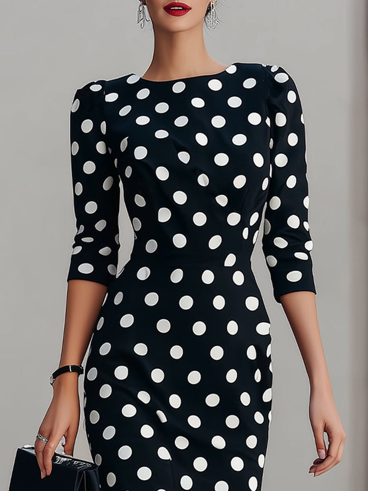Chic women's polka dot midi cocktail dress. Halter neck, bodycon fit. A vintage-inspired choice for evenings.