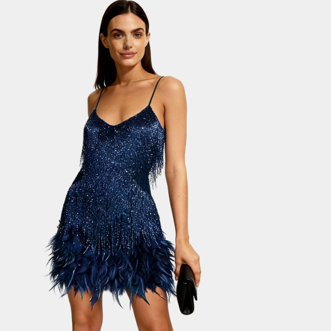 Stylish women's mini dress combining sequins and soft feather details.