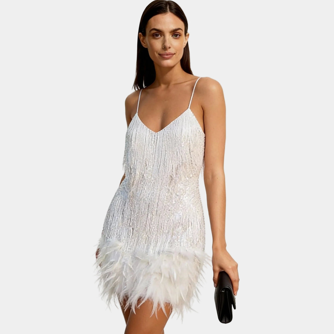 Chic feather and sequin party dress, ideal for a glamorous night out.