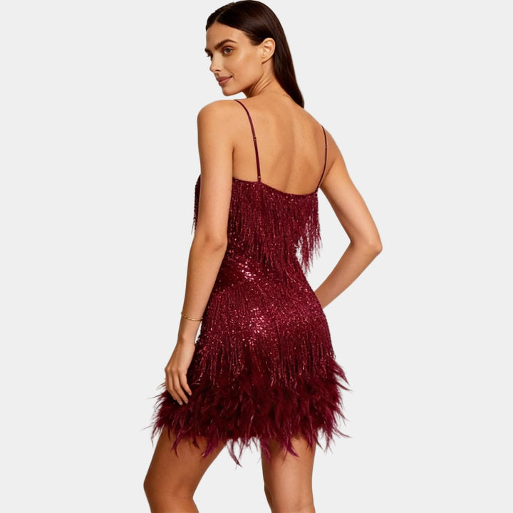 Eye-catching sequin feather cocktail dress, a statement party piece.