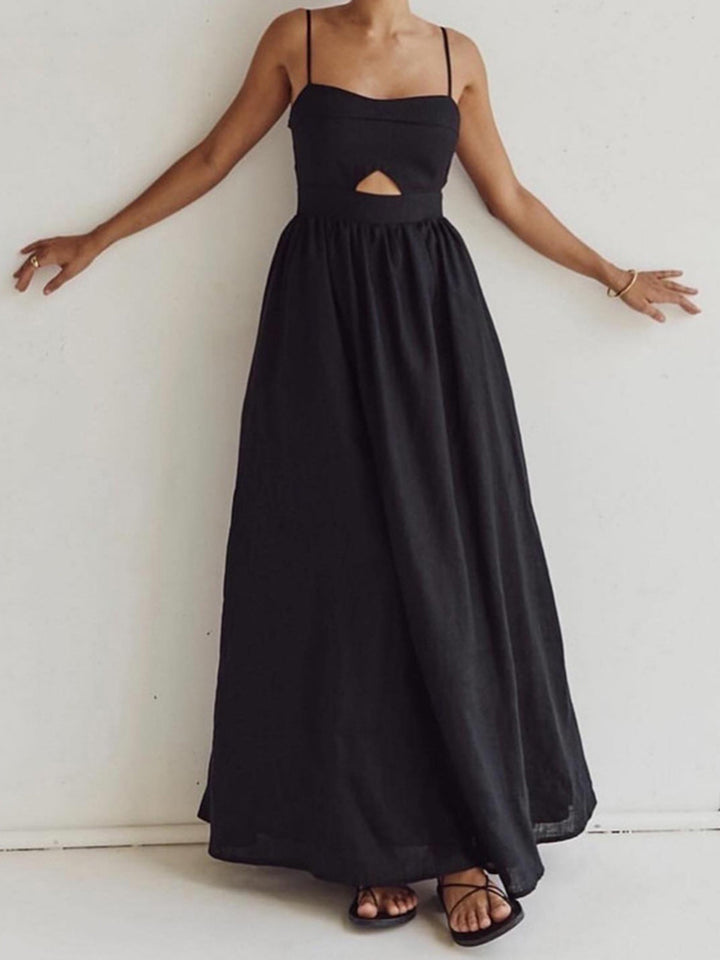 Elegant ladies' black sleeveless midi dress featuring a trendy cutout and practical side pockets.