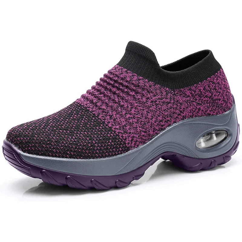 Women's black slip-on walking shoes, air-cushion sole, arch support for supreme comfort.