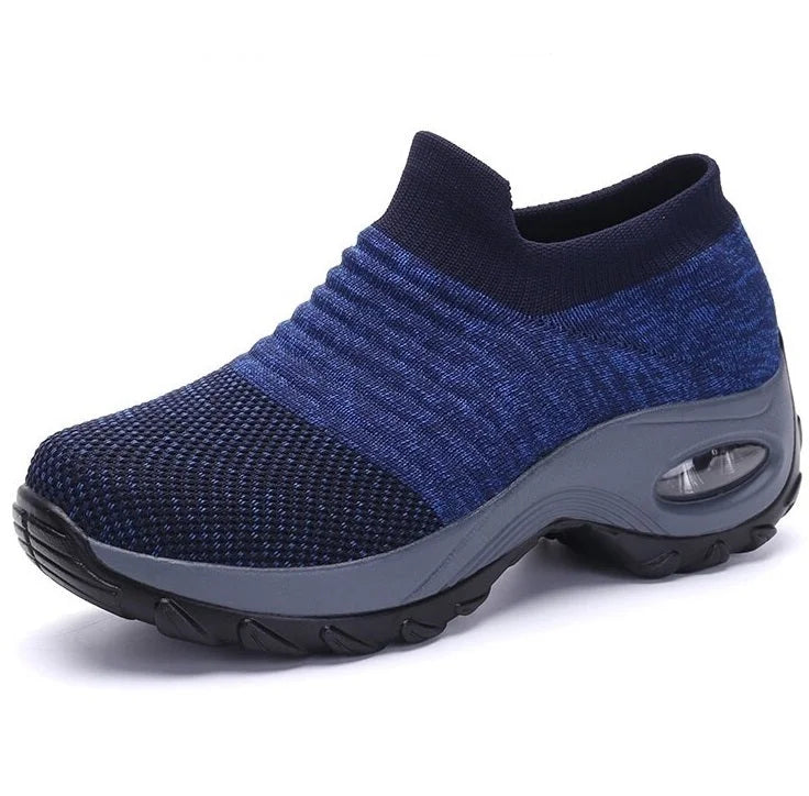 Comfortable & supportive women's slip-on sneakers, black, with air-cushion sole & arch support.