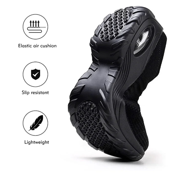 Women's black slip-on sneakers with air-cushion sole, providing excellent arch support & cushioning.