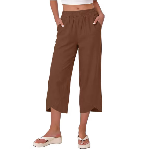 Back view of women's versatile stretch capri trousers, showing flattering wide leg design.