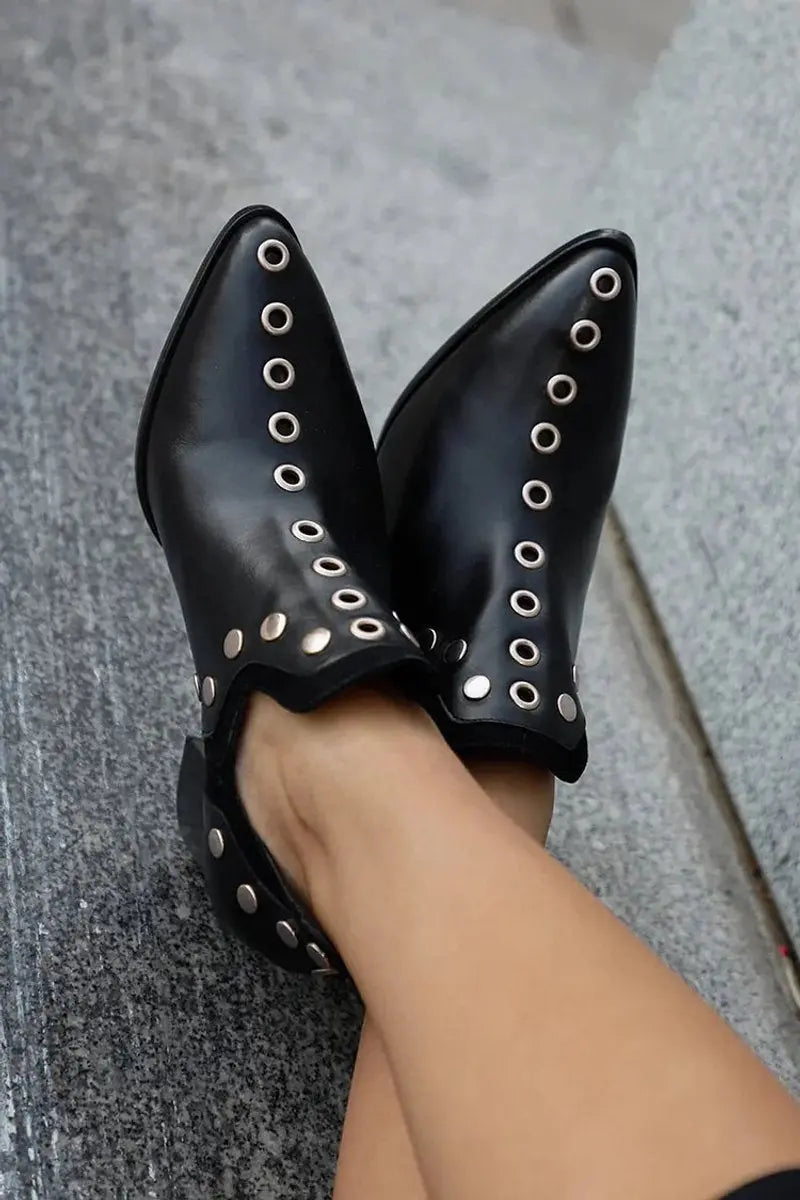 Stylish women's black ankle boots with studded details, a sturdy block heel, and pointed toe for modern edgy fashion.