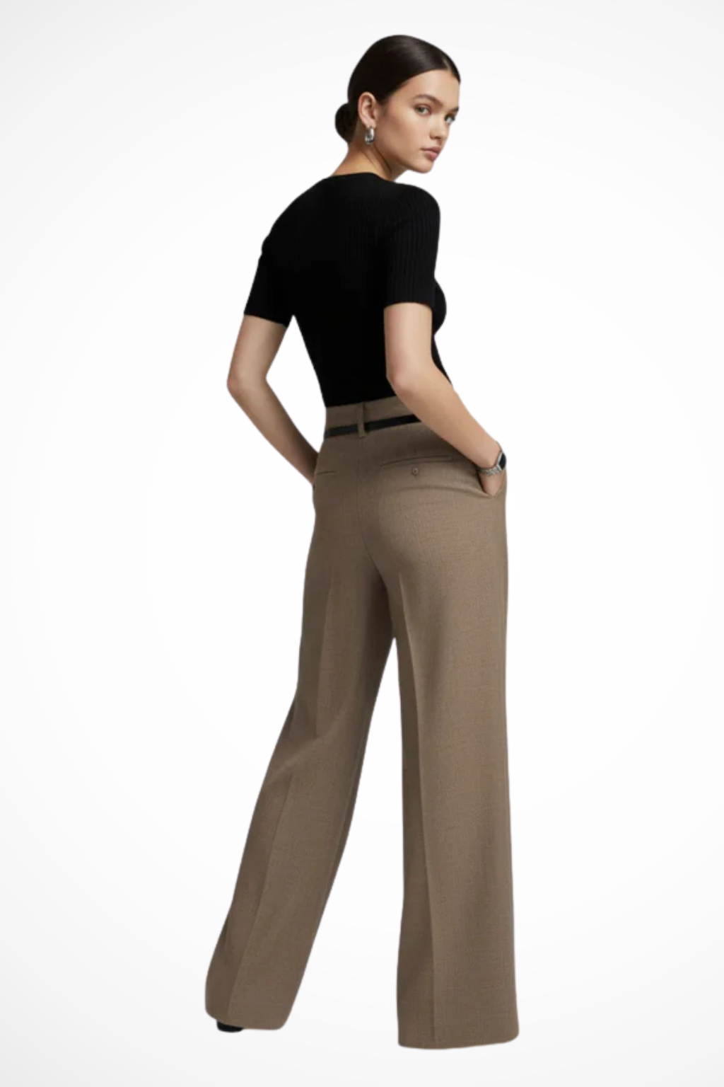 Front view of model wearing high-waisted black wide leg trousers with a fashion-forward pouch belt. Office wear.