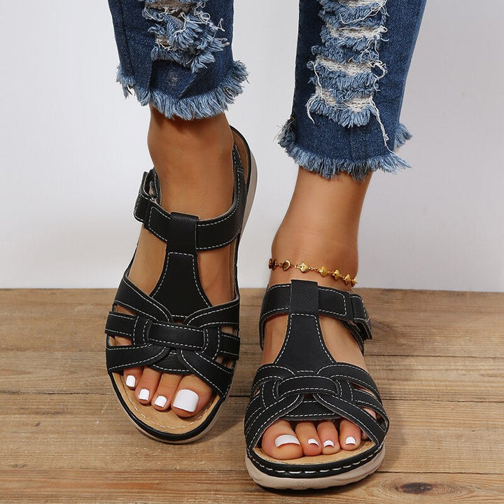 Supportive women's walking sandals with contoured arch support for ultimate all-day comfort.