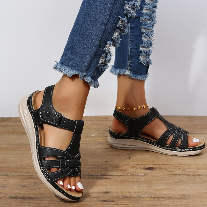 Comfortable women's walking sandals with arch support, ideal for everyday wear & travel.