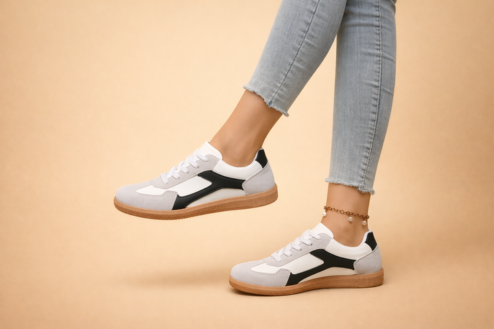 Stylish women's casual sneakers featuring a classic design for ultimate everyday comfort.