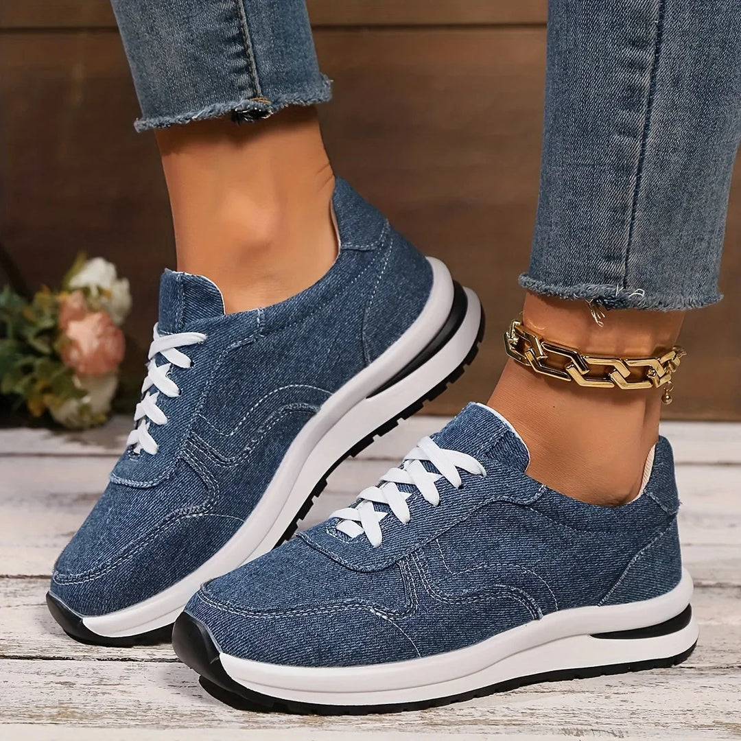 Women's blue denim orthopedic sneakers with arch support, designed for comfortable walking & casual style.