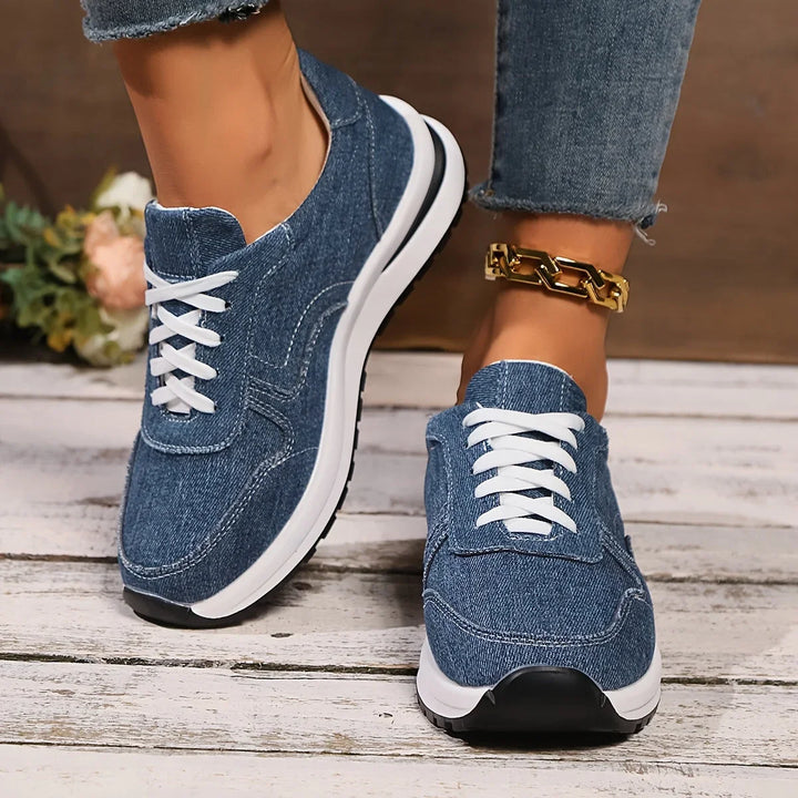 Stylish women's blue denim sneakers featuring arch support, wide toe box, and orthopedic comfort for daily wear.