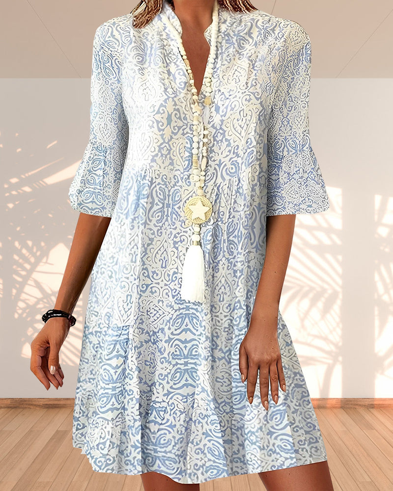 Women's blue floral boho midi dress. Effortless summer style, perfect casual bohemian fashion for everyday wear.