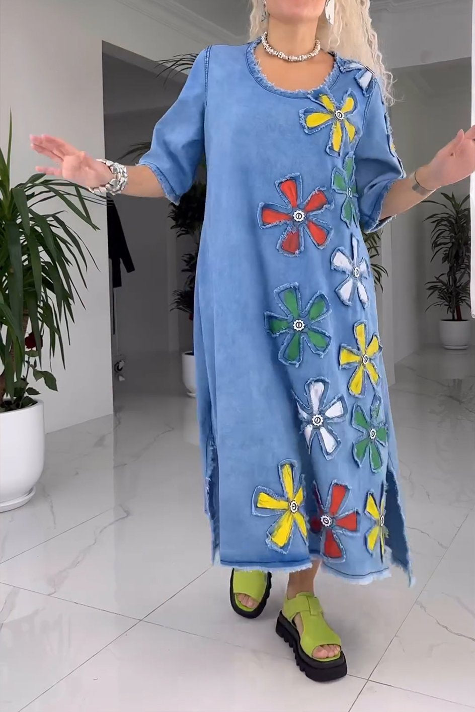 Women's blue floral denim maxi dress, a relaxed fit for casual spring and summer style.