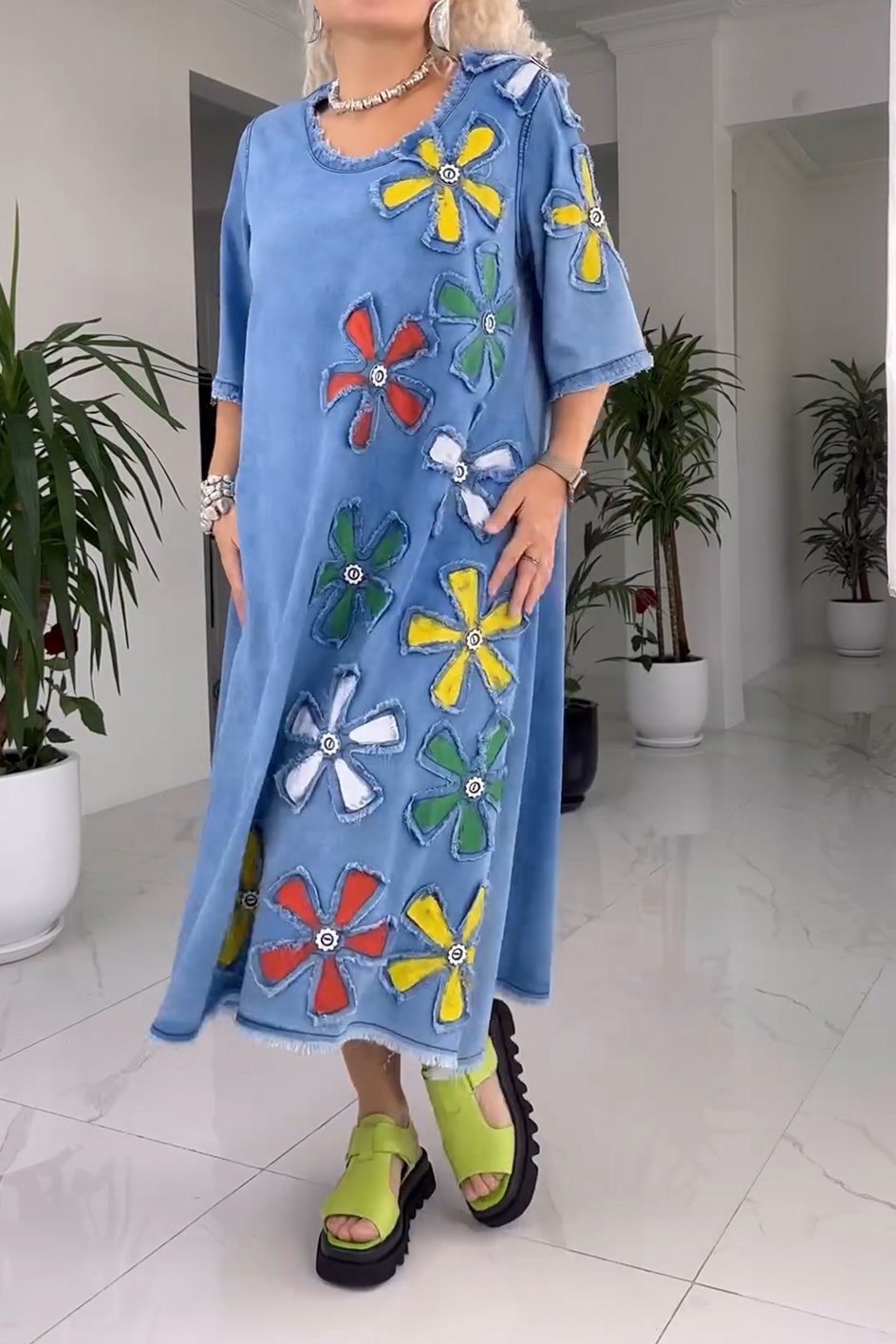 Elegant women's long denim floral dress, perfect for sophisticated holiday parties or relaxed outings.