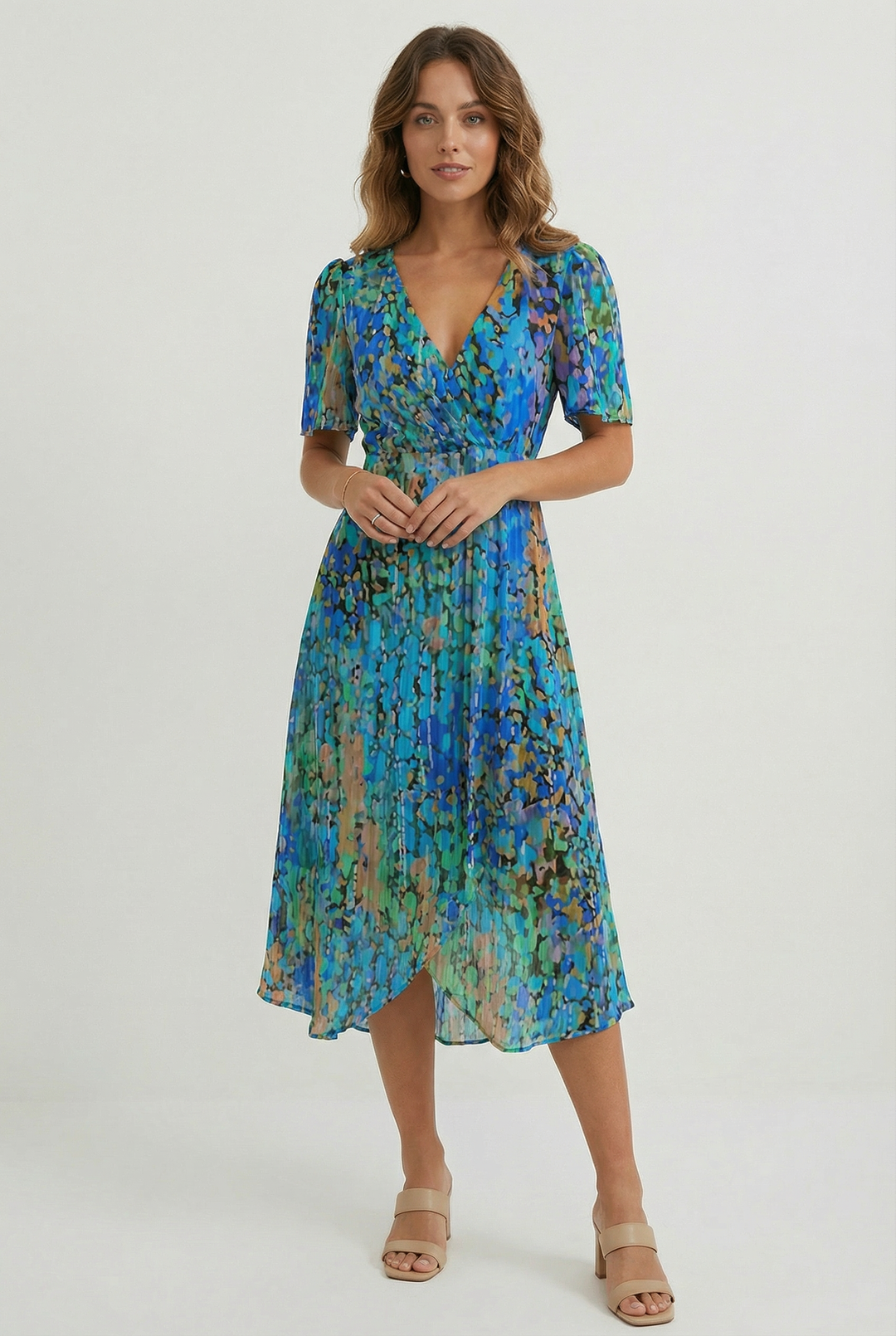 Women's blue floral linen midi dress with elegant fit for summer comfort.