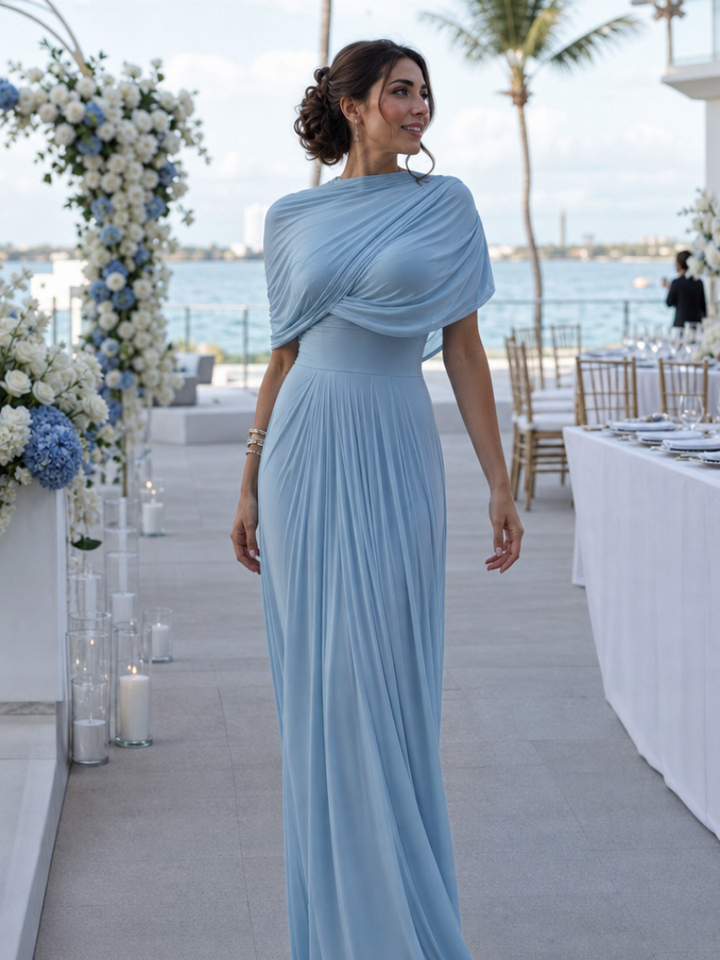 Women's blue one-shoulder draped bodice maxi dress with elegant pleated skirt, perfect for formal events.