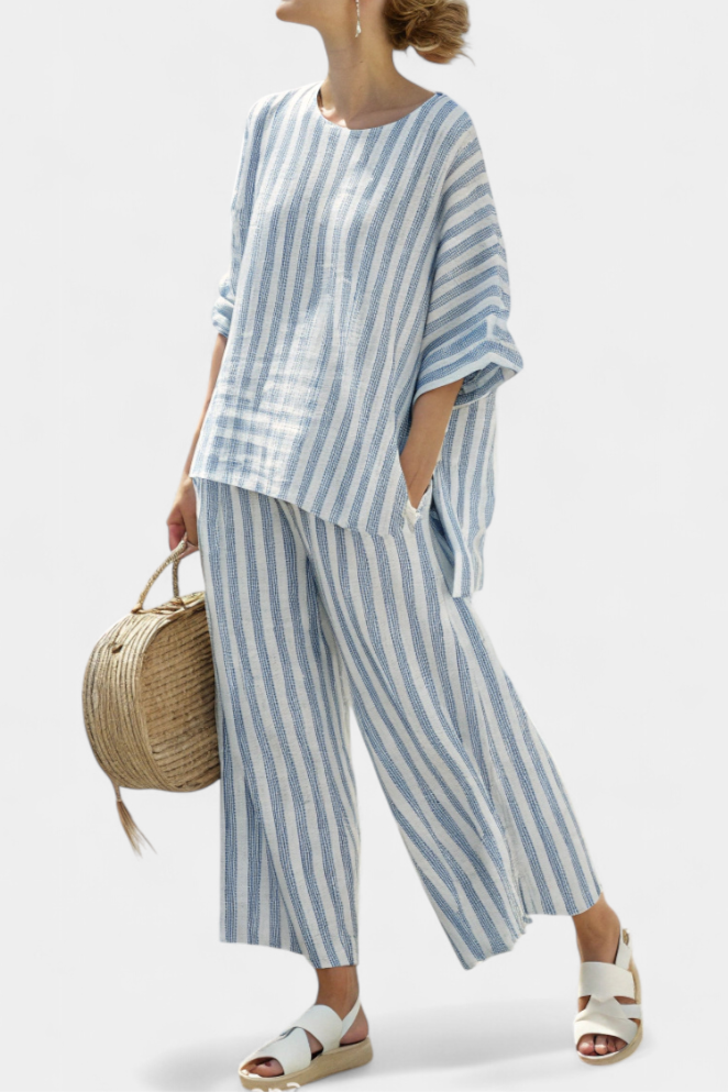 Women's blue striped top & relaxed trousers set, perfect for summer casual chic and vacation wear.