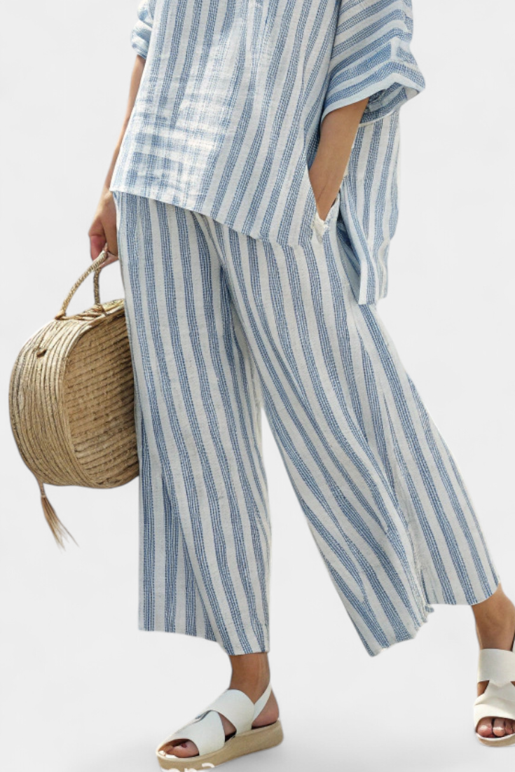 Comfortable women's blue stripe top & relaxed pants set, ideal for casual wear, summer, or vacation.