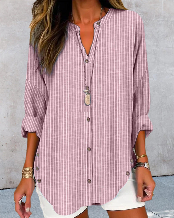 Versatile women's blue striped V-neck top, perfect for summer casual wear and everyday chic style.