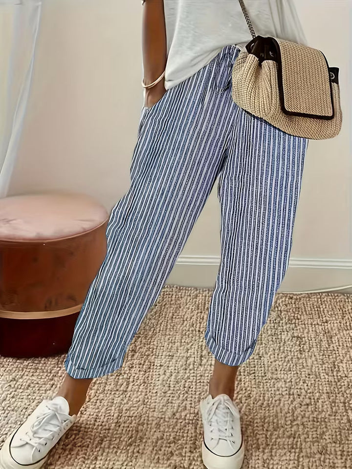 Women's blue striped wide-leg casual pants with elastic waist for comfortable summer style.