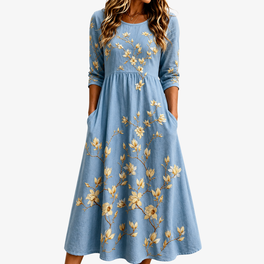 Women's Bluebell Meadow floral print midi dress with pockets. Elegant, comfortable, and flowy for summer casual wear.