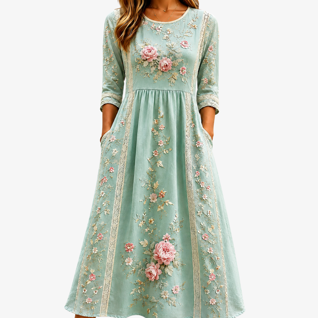 Women's blush rose floral midi dress with short sleeves & A-line cut, perfect for garden parties or summer.
