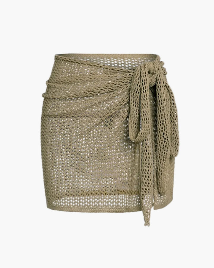 Women's bohemian beach cover-up wrap skirt with tie straps, ideal for swimwear, resort wear, or vacation.