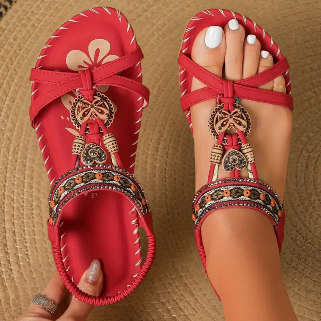 Comfortable women's bohemian flat T-strap summer sandals, perfect for vacation & casual wear.