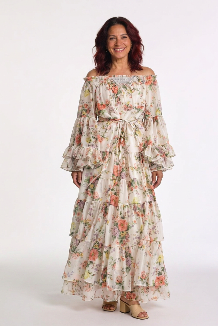 Stylish women's floral maxi dress. Bohemian design with eye-catching ruffle bell sleeves & waist tie.
