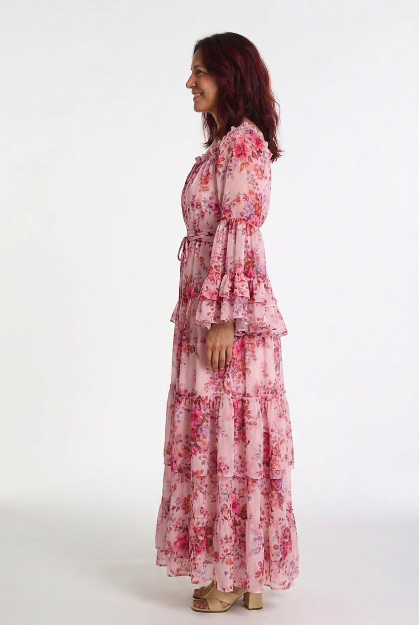 Elegant women's floral maxi dress. Bohemian style with flowy ruffle bell sleeves. Tie waist design.