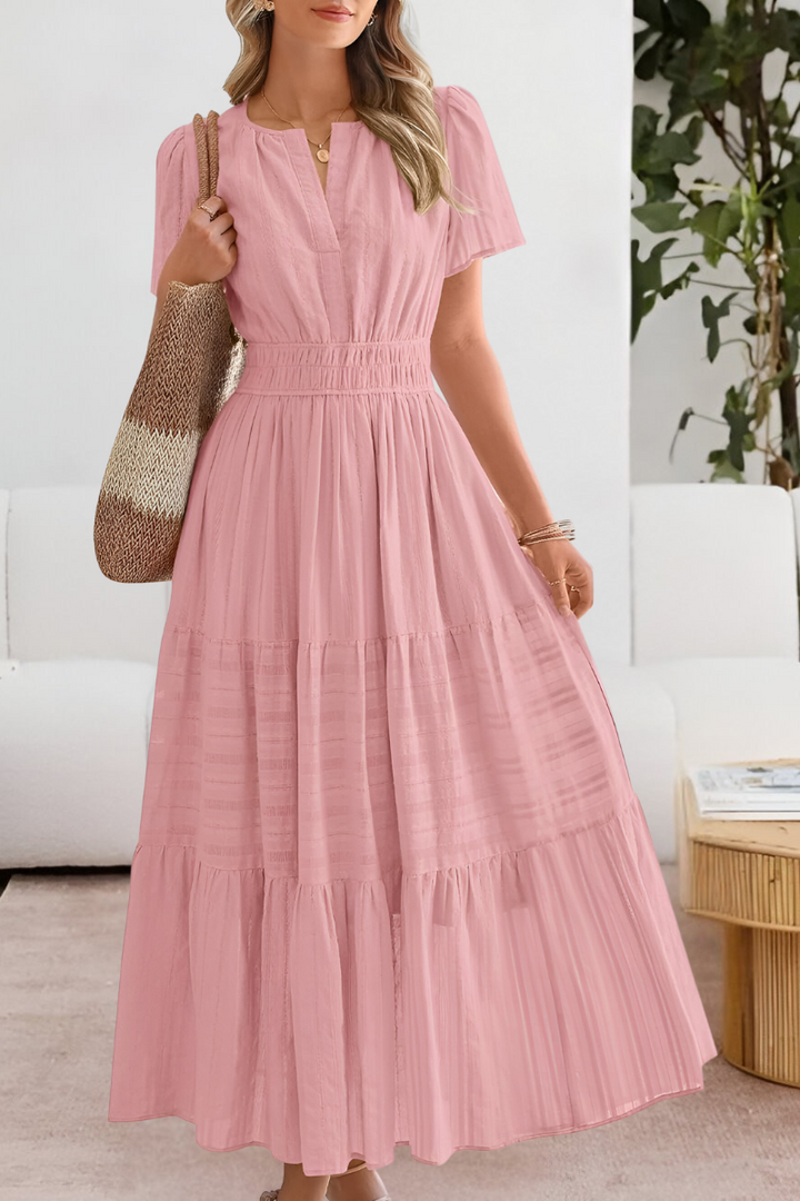 Versatile women's short sleeve midi dress, bohemian style, with a comfortable smocked top for casual wear.