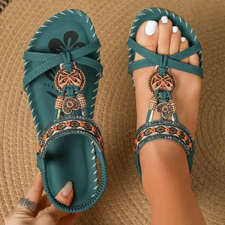 Women's Bohemian orthopedic sandals with beaded T-strap design for comfort and style.
