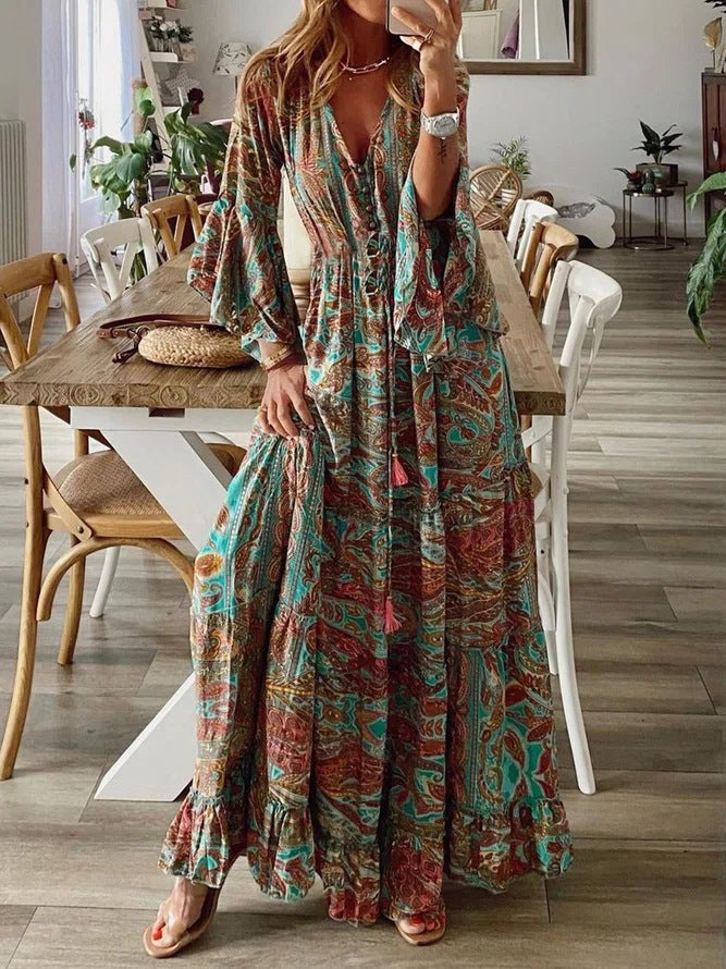 Summer women's maxi dress with a unique paisley print and chic flared sleeves, very flowy.