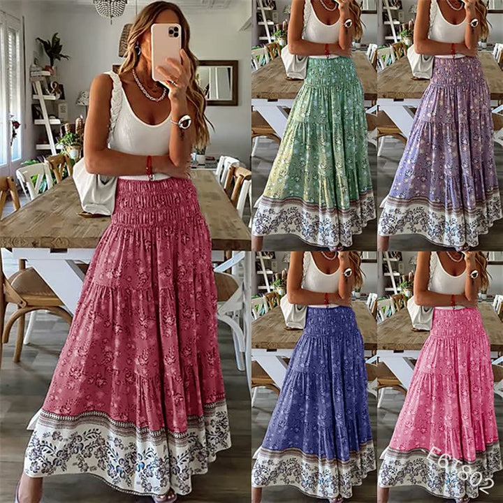 Women's bohemian tiered midi skirt, flowing fabric, elastic waist. Perfect for summer casual or vacation fashion.