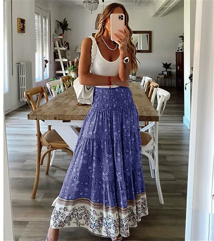 Comfortable elastic waist women's midi skirt, featuring a flowing bohemian tiered design for summer fashion.