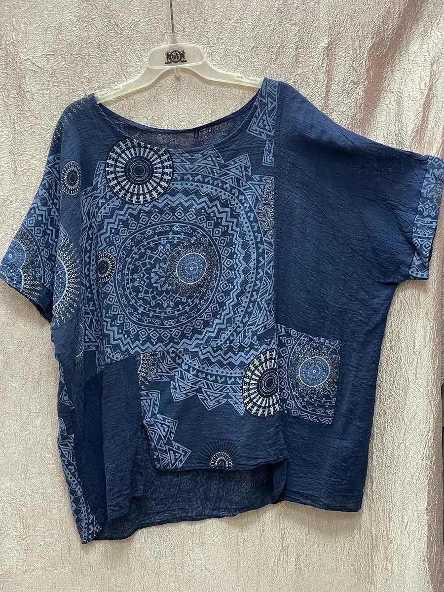 Relaxed fit women's two-piece outfit: mandala print top & wide-leg drawstring pants. Ideal for casual or vacation wear.