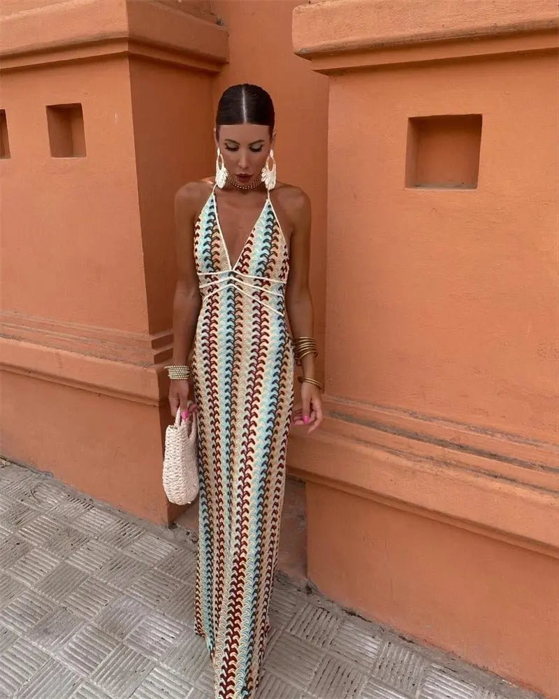 Women's boho crochet halterneck maxi dress, perfect for beach weddings & summer vacations.