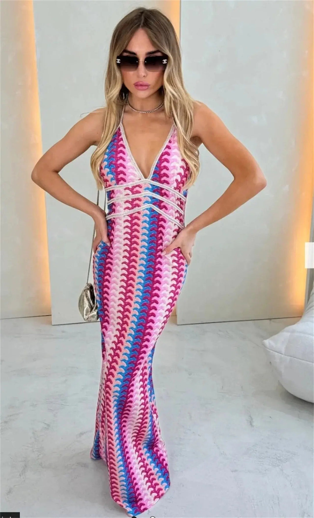 Women's white boho crochet maxi dress, elegant halterneck design for beach weddings & summer events.