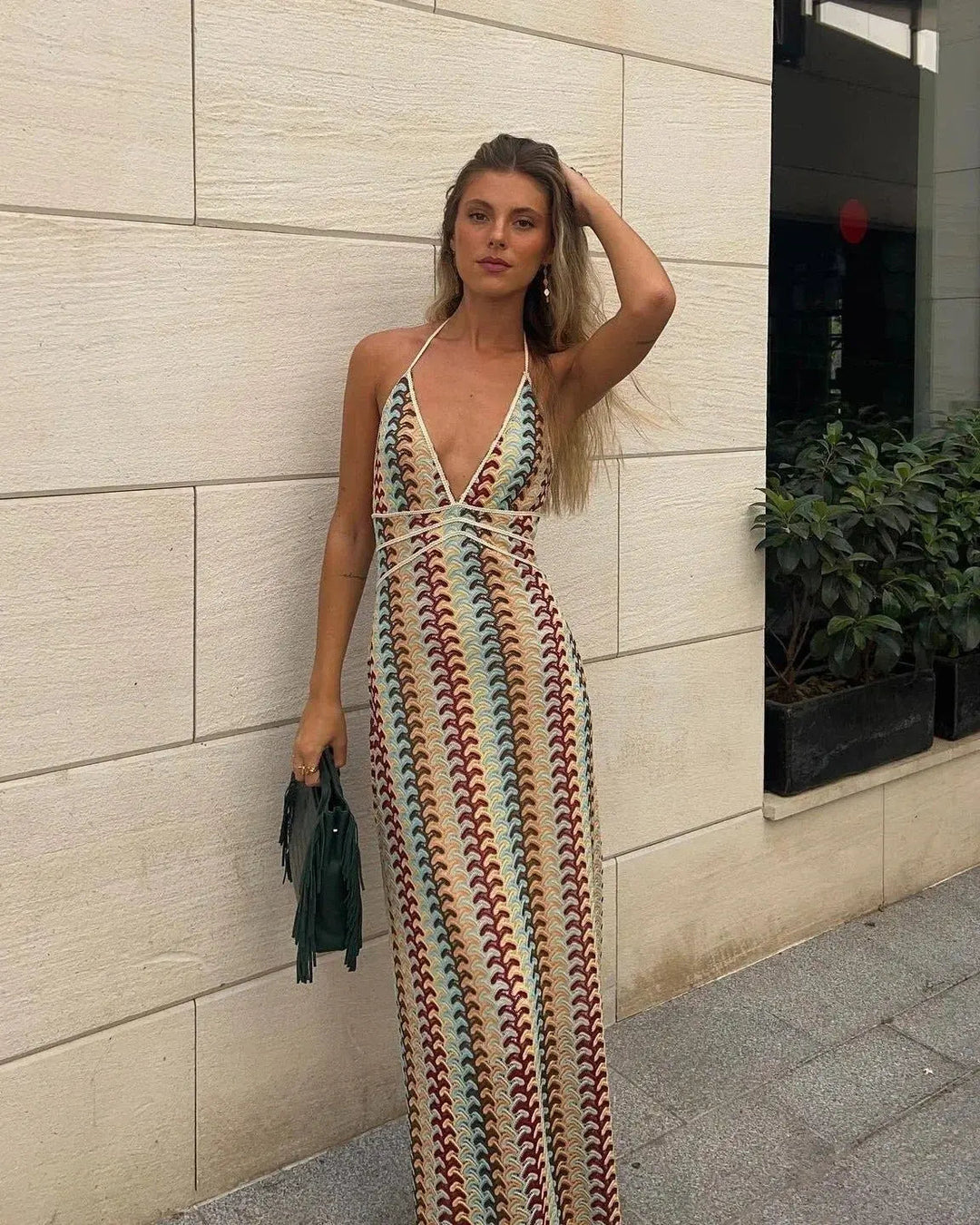 Stunning women's boho crochet maxi dress, a stylish halterneck gown for beach vacations & resort wear.