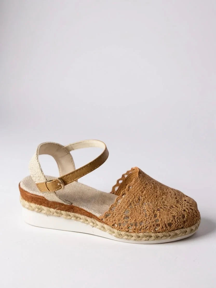 Chic women's closed-toe platform sandals. Boho crochet design with comfortable ankle strap.