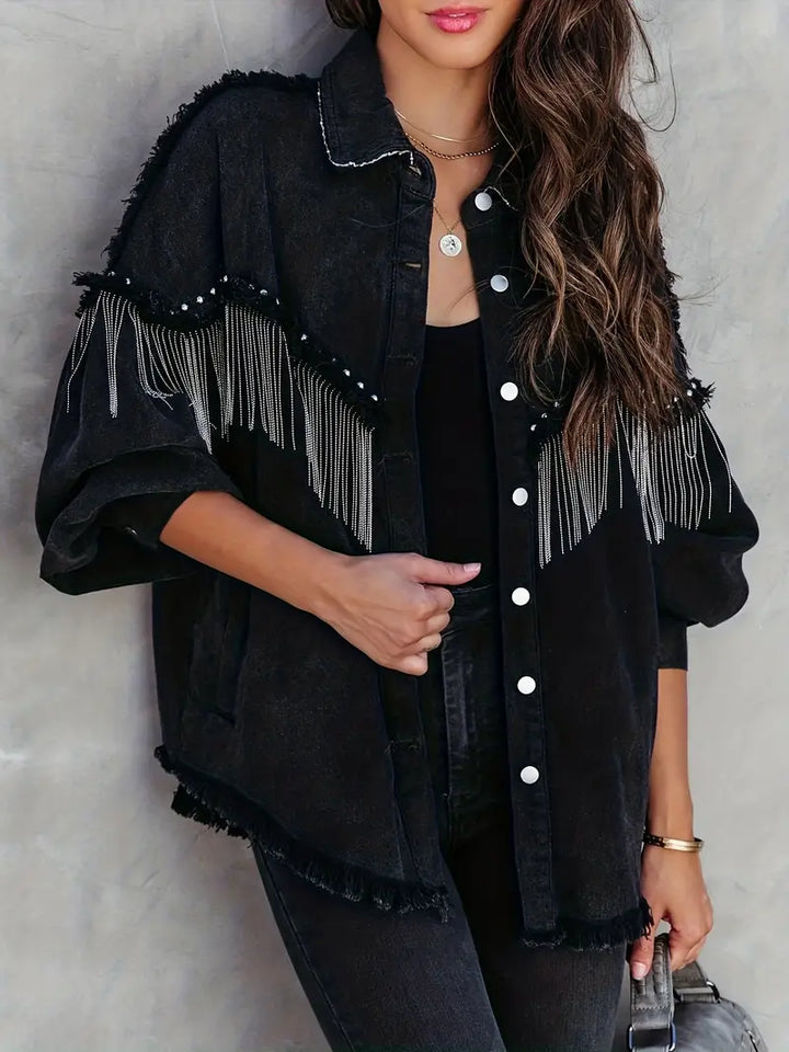 Chic women's boho denim jacket with stylish fringe and stud embellishments, a trendy piece for casual fashion.