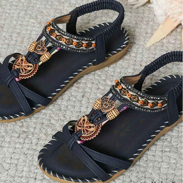 Vacation-ready women's floral embellished boho sandals featuring a comfortable slingback design.