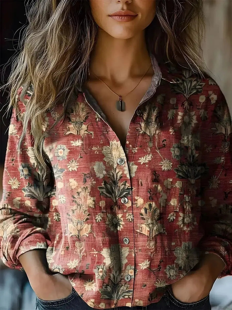 Vibrant women's floral print button-up blouse with long sleeves, perfect for boho style.