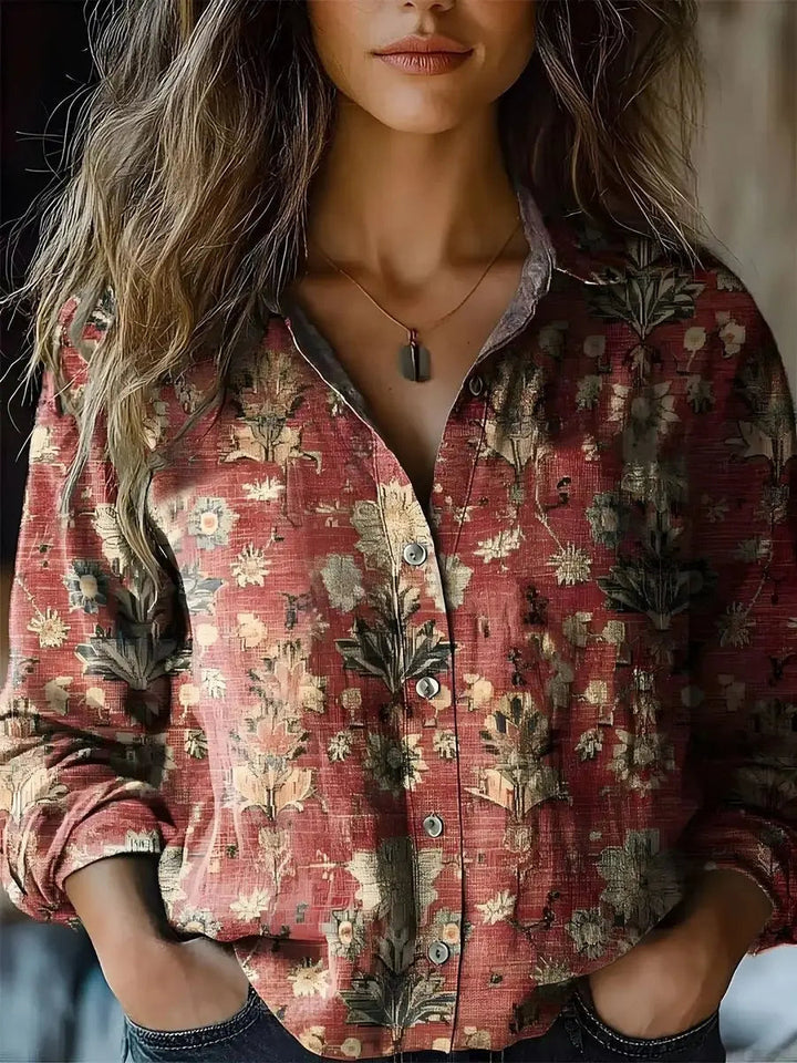 Vibrant women's floral print button-up blouse with long sleeves, perfect for boho style.